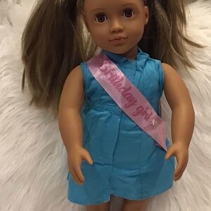Charming Doll in Blue Dress with Pink Sash